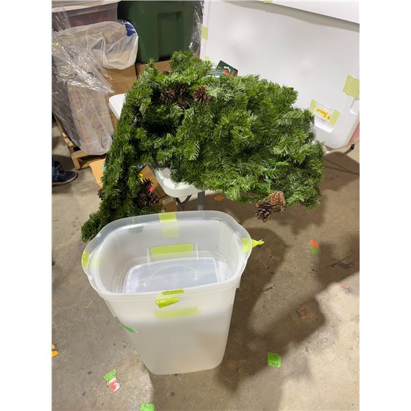 Christmas garland with pinecones and gift wrap