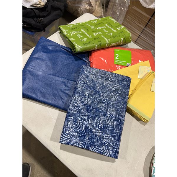 Plastic tablecloth table cloths, disposable napkins and cloth napkins