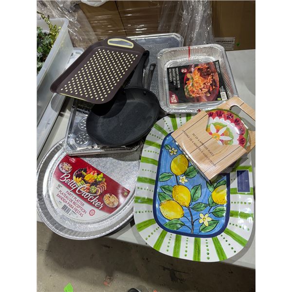 Assorted kitchen items and party serving items