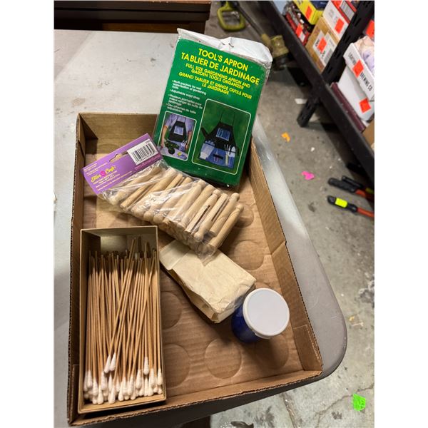 Q-tips clothes, bags, tools, apron, and other items