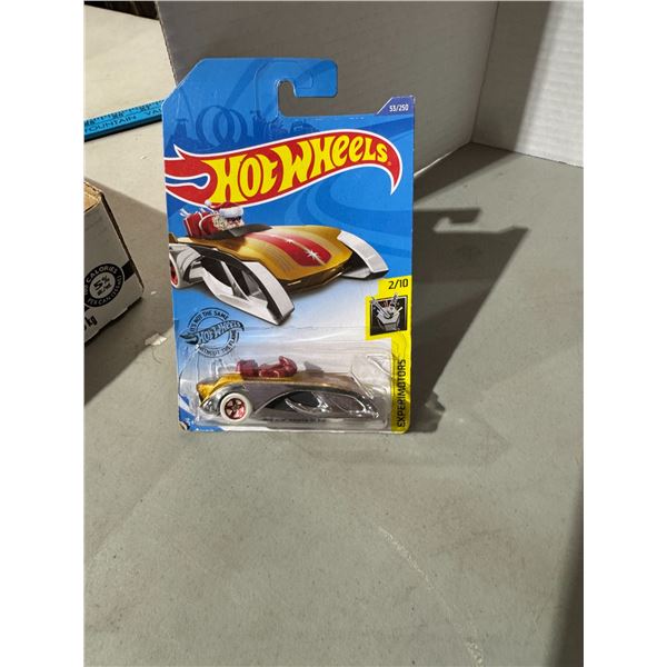 Hot wheels, rock, and Santa sled