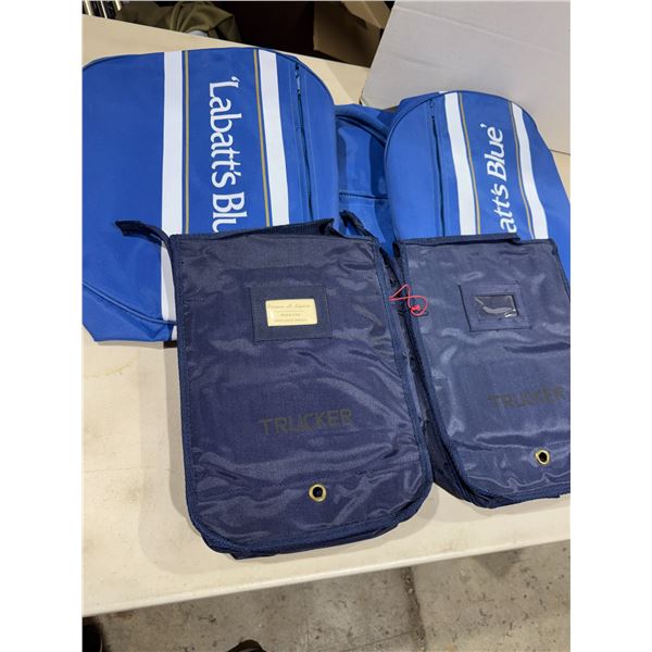 The bat blue duffel bag and trucker bags