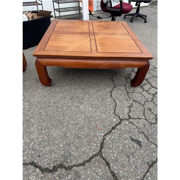 Large coffee table measures 42" x 42" x 16"