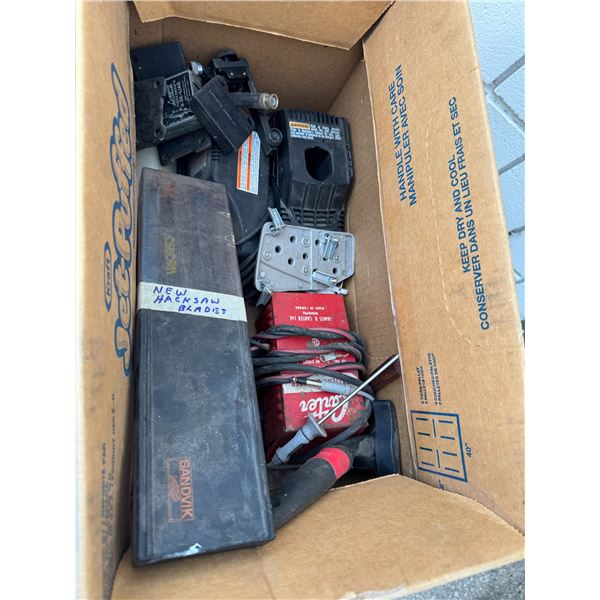 Hack saw blades and battery charger, etc.