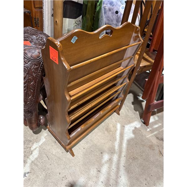 Maple stand measures by 12 inches deep and 28 1/2 inches tall