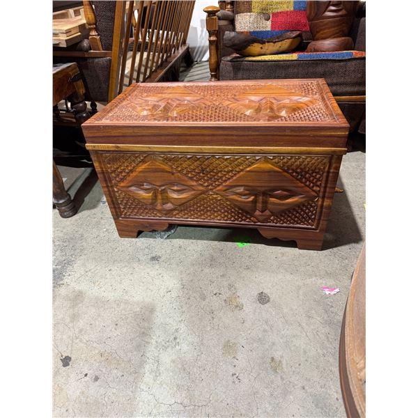 Carved chest measures 26" x 16" x 16" tall