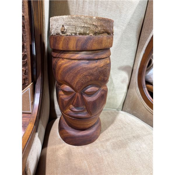 Carved drum measures 18 inches tall