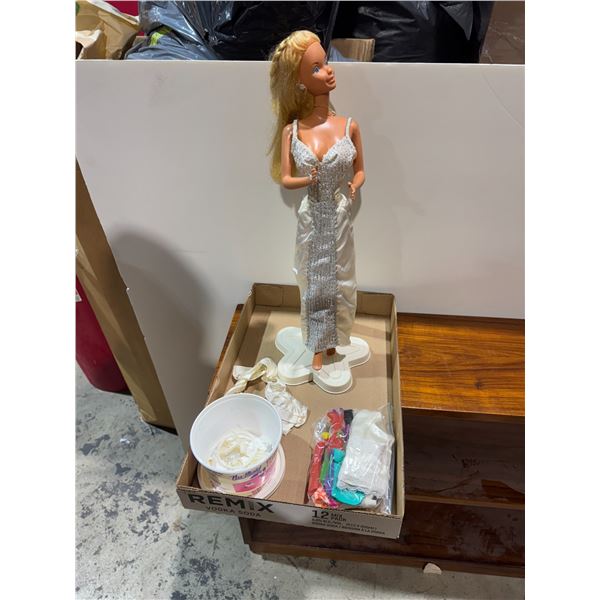 Large Barbie on stand 1976