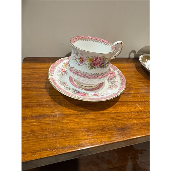 Queens, teacup, and saucer