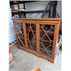 Image 1 : Display cabinet with key measures 5 feet long 15 inches deep 48 1/2 inches tall.