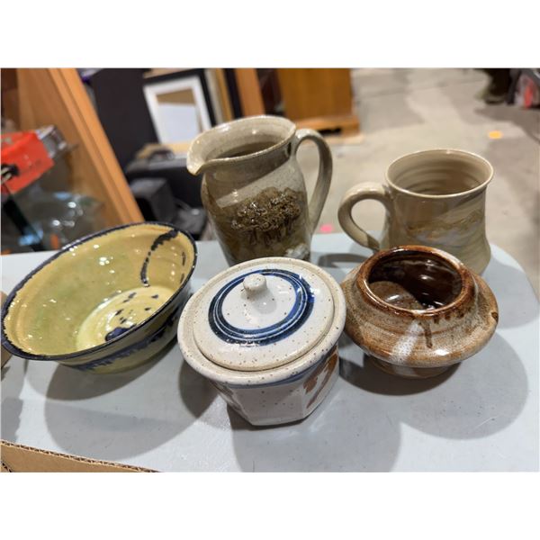 Pottery piece some signed