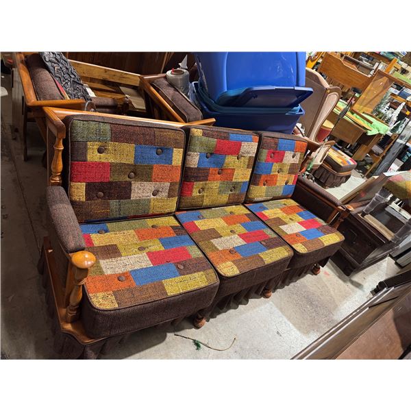 vintage maple couch with patchwork cushions