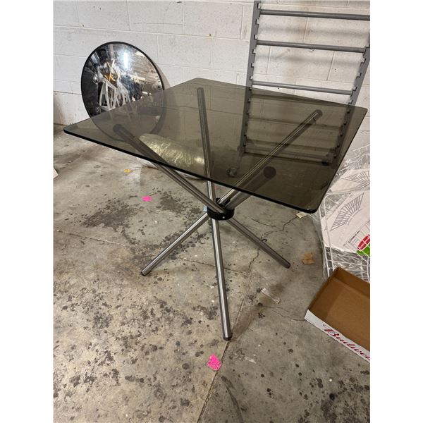 Smoked glass, folding pedestal table
