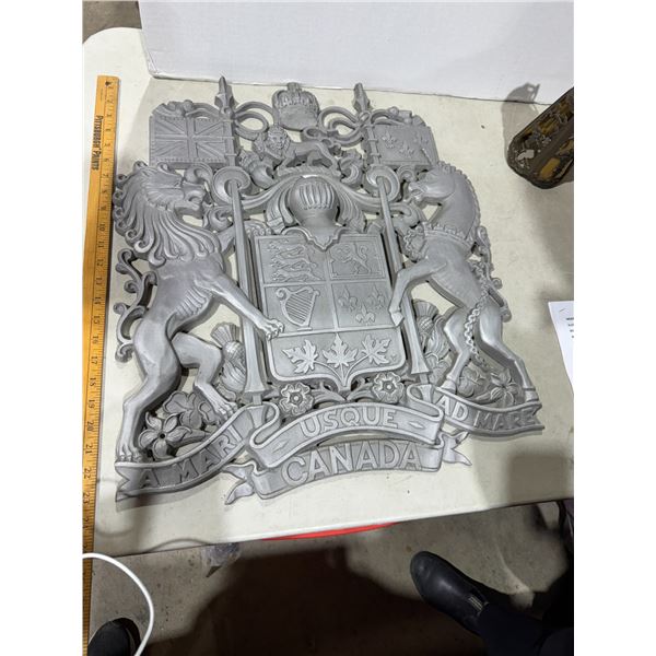 Large silver metal replica of coat of arms of Canada