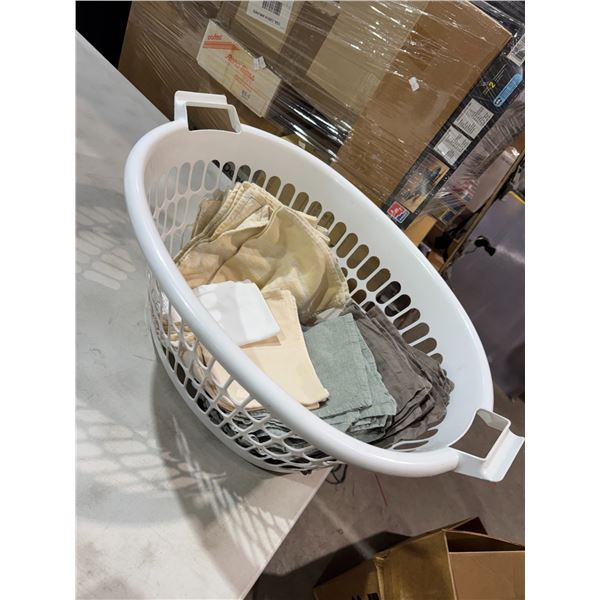 Napkins and other linens and laundry basket
