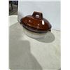 Image 1 : Smaller pottery, lit baking dish