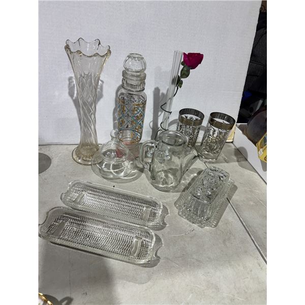 Assorted glassware, corn, cob holders, butter, dish, etc.