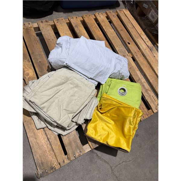 Assorted linen curtains, pillow, shams, and bedding
