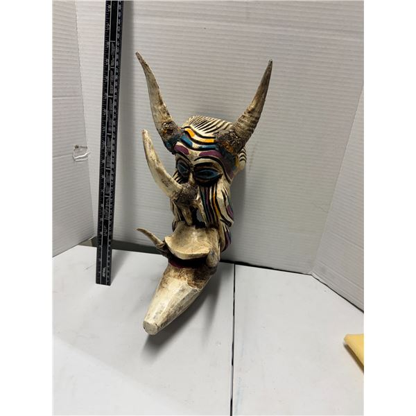 hand-carved and hand-painted wooden devil mask