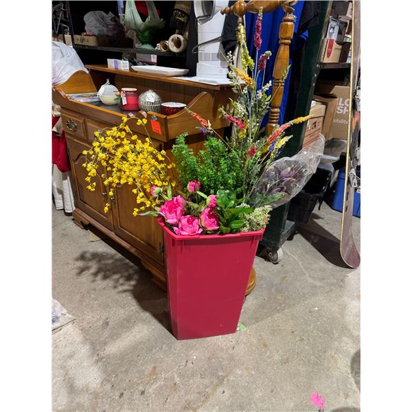 Bin with crafting flowers and floral decor