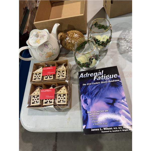 Christmas decor, glasses, teapot, pottery, bird, and a book