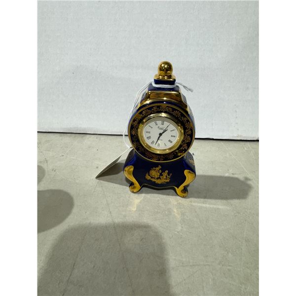 Imperial Lambo 22K on porcelain clock, France