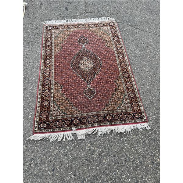 Persian rug measures 40" x 58"