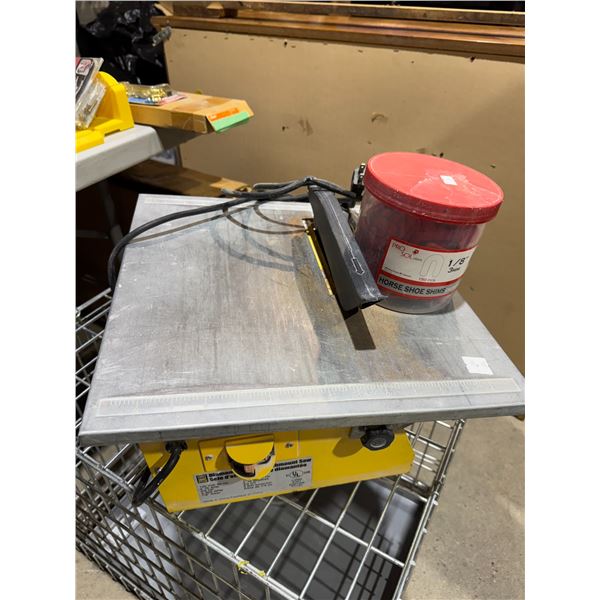 Tile cutter and tile spacers