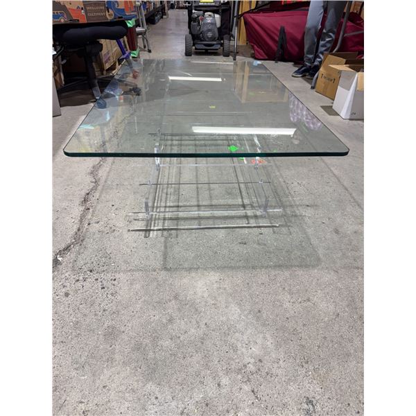Mid-century coffee table with Lucite base  and glass top