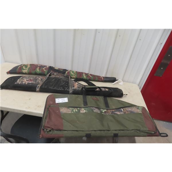 Two Soft Gun Cases and One Bow Case