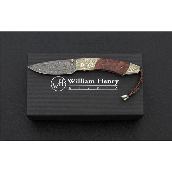 One of 20 William Henry Model B12-1121 Timberline Button Lock Folding Knife