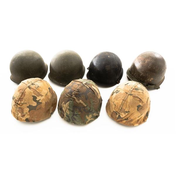 Lot of Seven (7) U. S. M1 Helmets