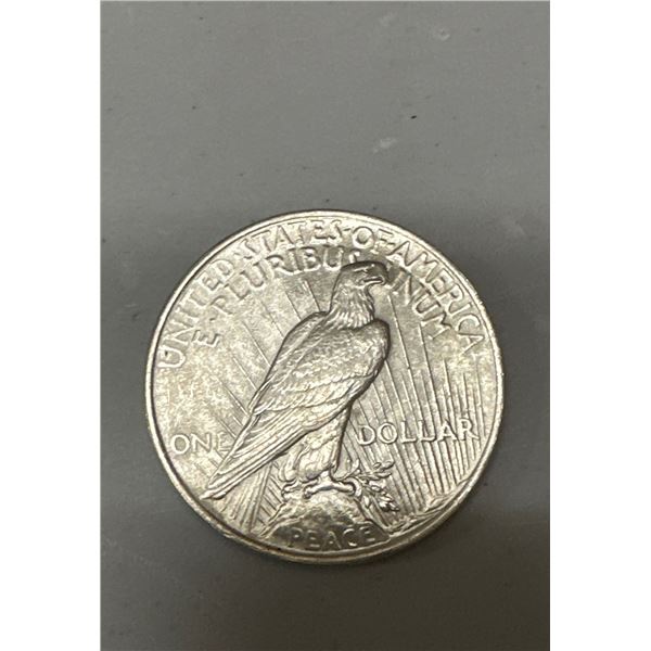 1923 MS 62 + Peace Silver Dollar