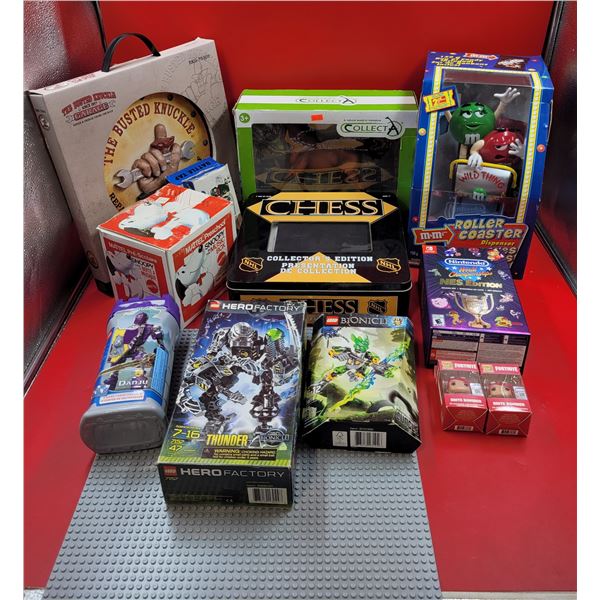 Assorted Toy Lot w/ NHL Chess, Snoopy Music Box, Lego Action Figures, & More