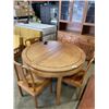 Image 1 : ROUND ROSEWOOD DINING TABLE 2 EXTENSIONS AND 4 CHAIRS, ONE LEG IS CRACKED AND NEEDS REPAIR
