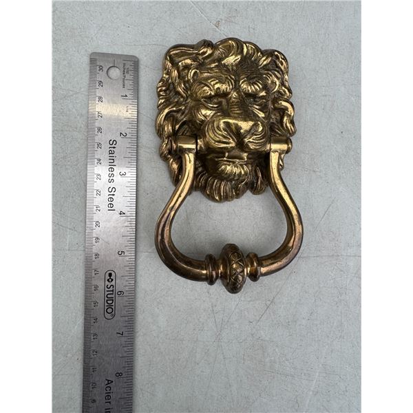 Brass lion door knocker