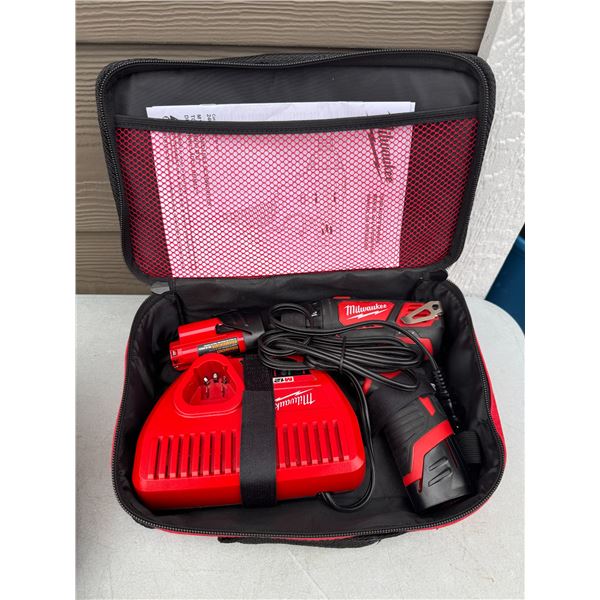 Milwaukee M2 cordless screwdriver with charger and battery