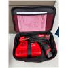 Image 1 : Milwaukee M2 cordless screwdriver with charger and battery
