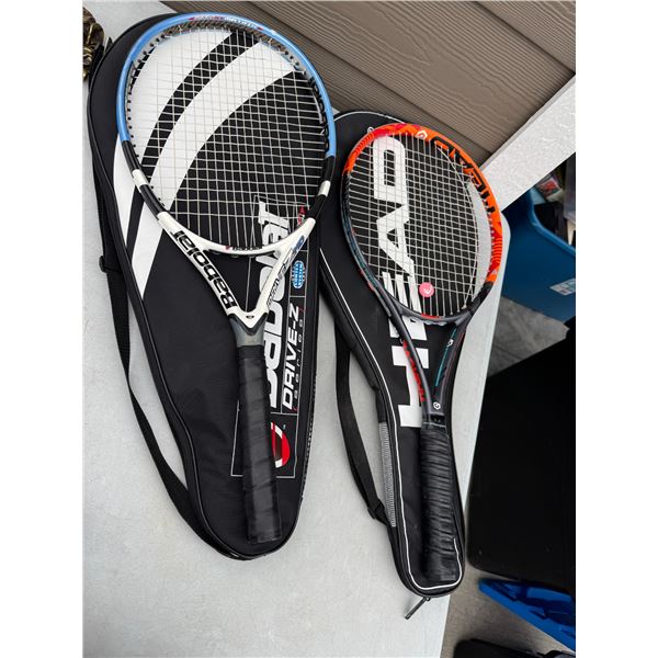 Tennis rackets with carrying cases