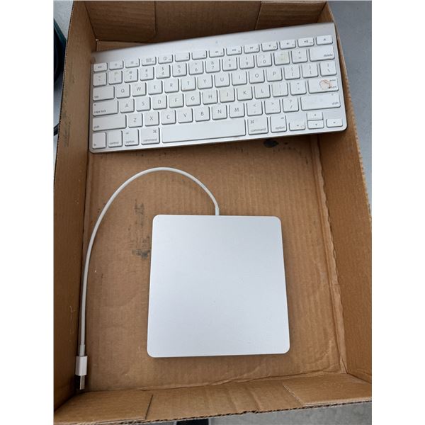 Apple, external hard drive and keyboard