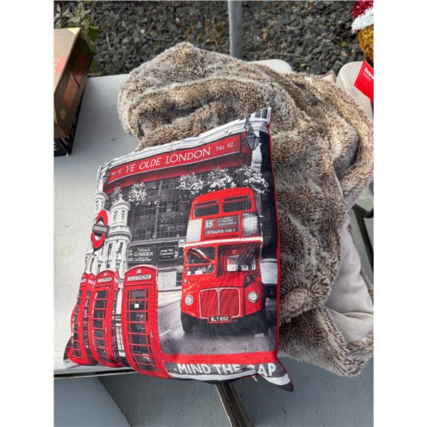 Restoration hardware, blanket, and other London threw a pillow