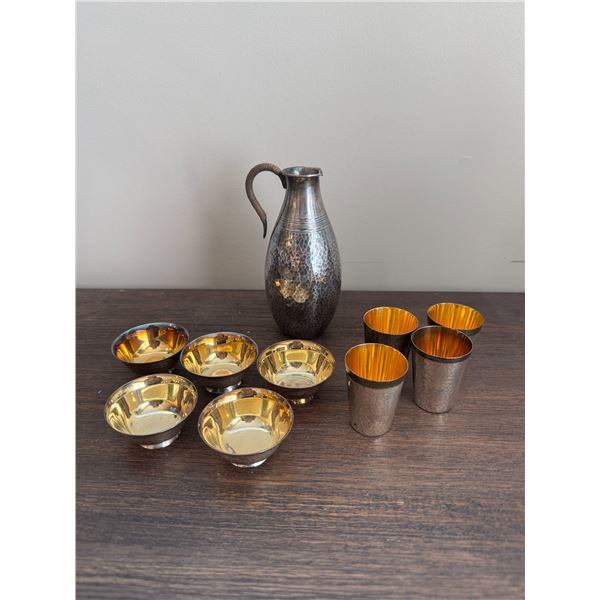 Thousand hammered Sterling sake set with 24 karat line sake set