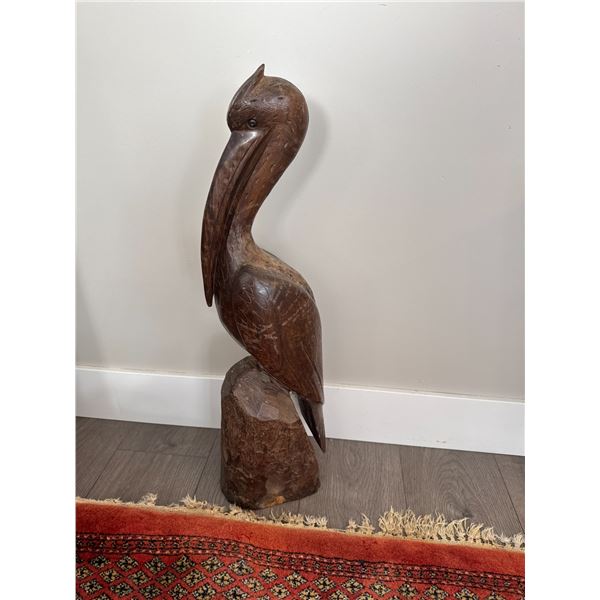 Carved pelican  27 inches tall