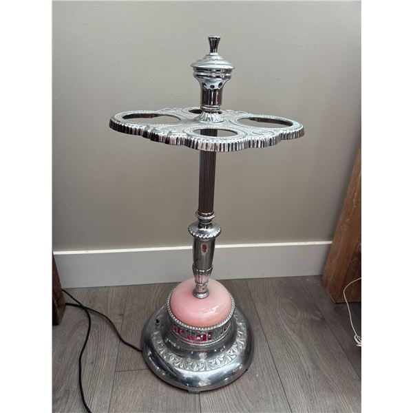 Antique ashtray with lighter base lights up