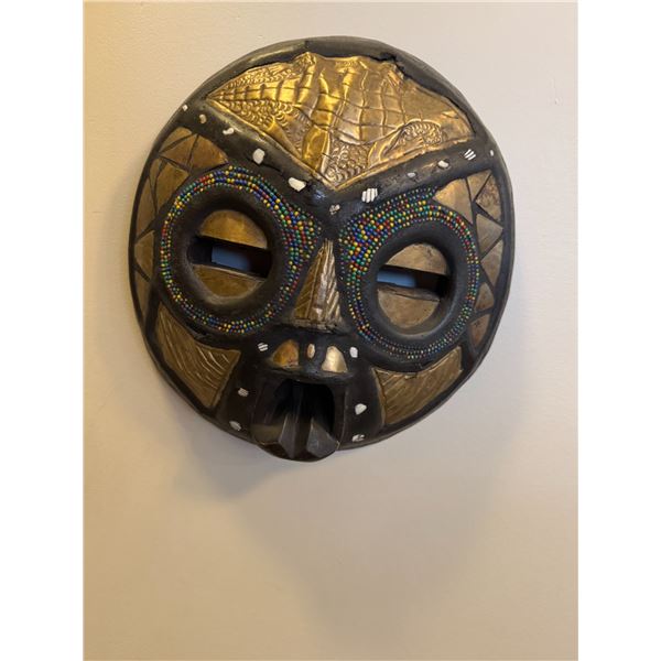 West African Ashanti Buluba tribal mask, handcrafted from wood and inlaid with hammered brass and gl