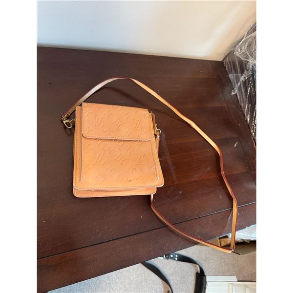 Louis Vuitton purse, authenticities up to buyer to verify