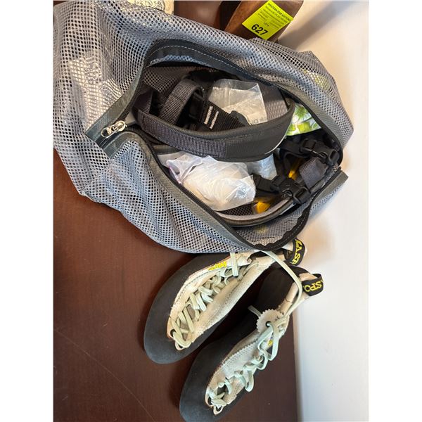 Rock climbing gear shoes are 6 1/2 men's 7 1/2 women's