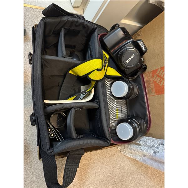 Nikon F7 camera with extra lenses and bag