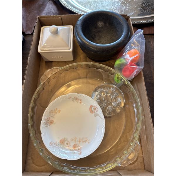 Assorted kitchen items and flower dog