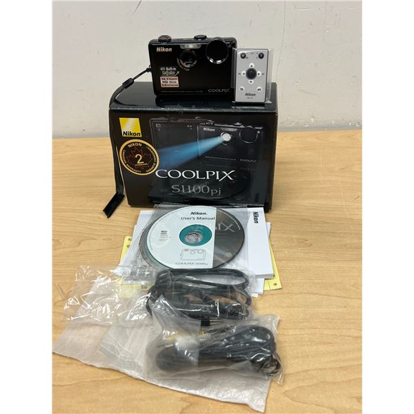 Nikon Coolpix S1100pj Digital Camera with Remote & Extras 14.1 Megapixel